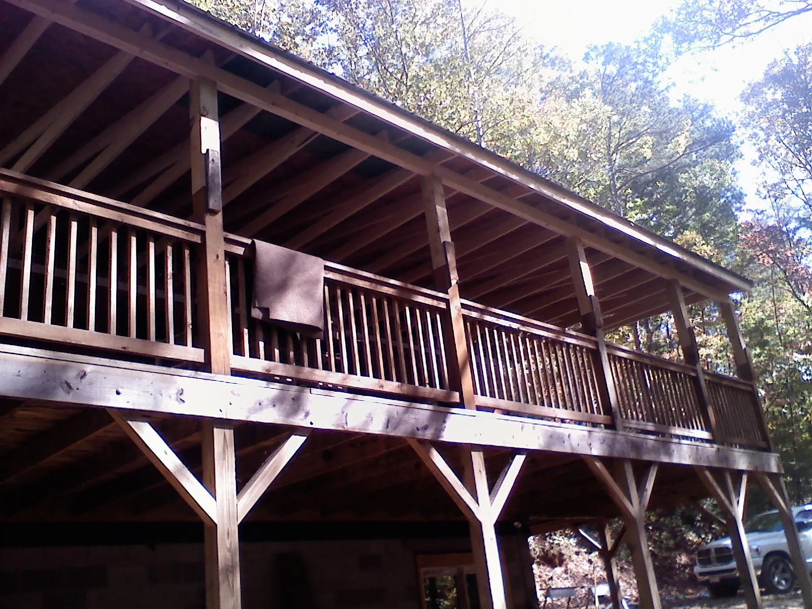 Timber framing under a new elevated porch and deck — Roof Leak Repair in Greenville by Roofing Brothers